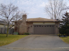  2 car attached garage at side of house