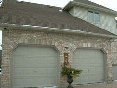 Garage at side of house tucked away