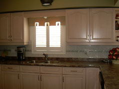 Kitchen laden with cupboards