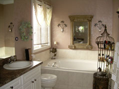 Master ensuite with whirlpool soaker tub and his & her basins