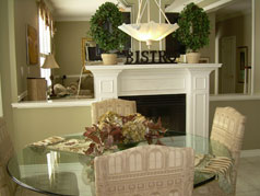 Eat-in area shares fireplace with family room