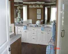 Fabulous master ensuite with his & her sinks, coni marble shower & wall of mirrors