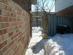 Cobblestone pathway to backyard