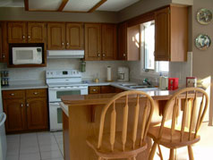 Bright kitchen with luncheon bar