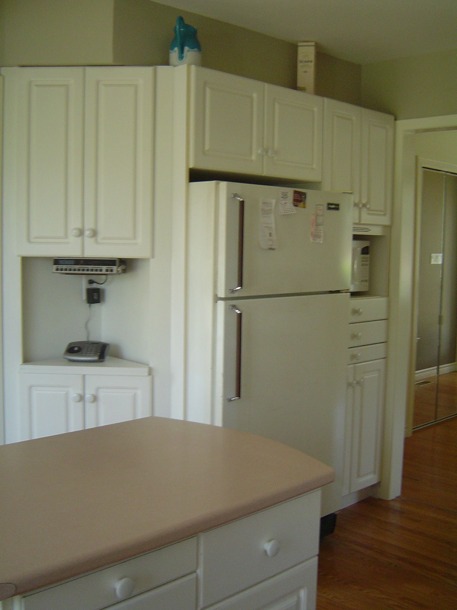 Island in the kitchen makes extra counter and cupboard space